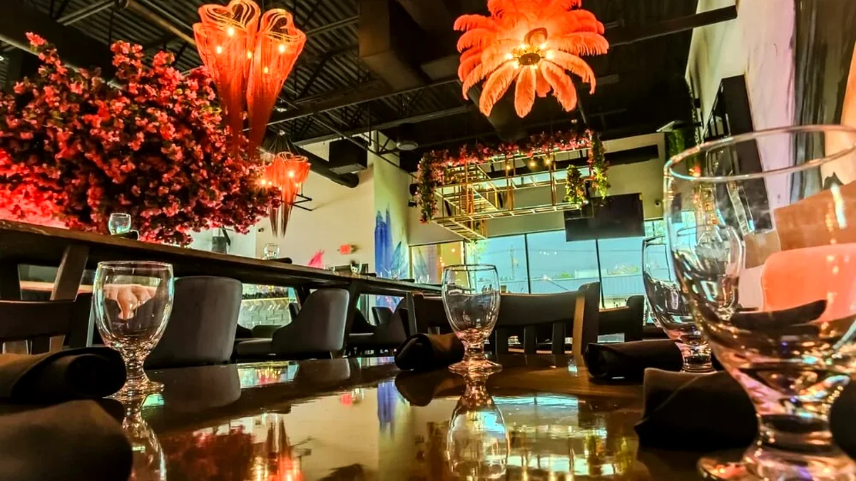 Elegant dining interior at La Chuparosa restaurant in Waukegan Illinois with modern lighting and table setup